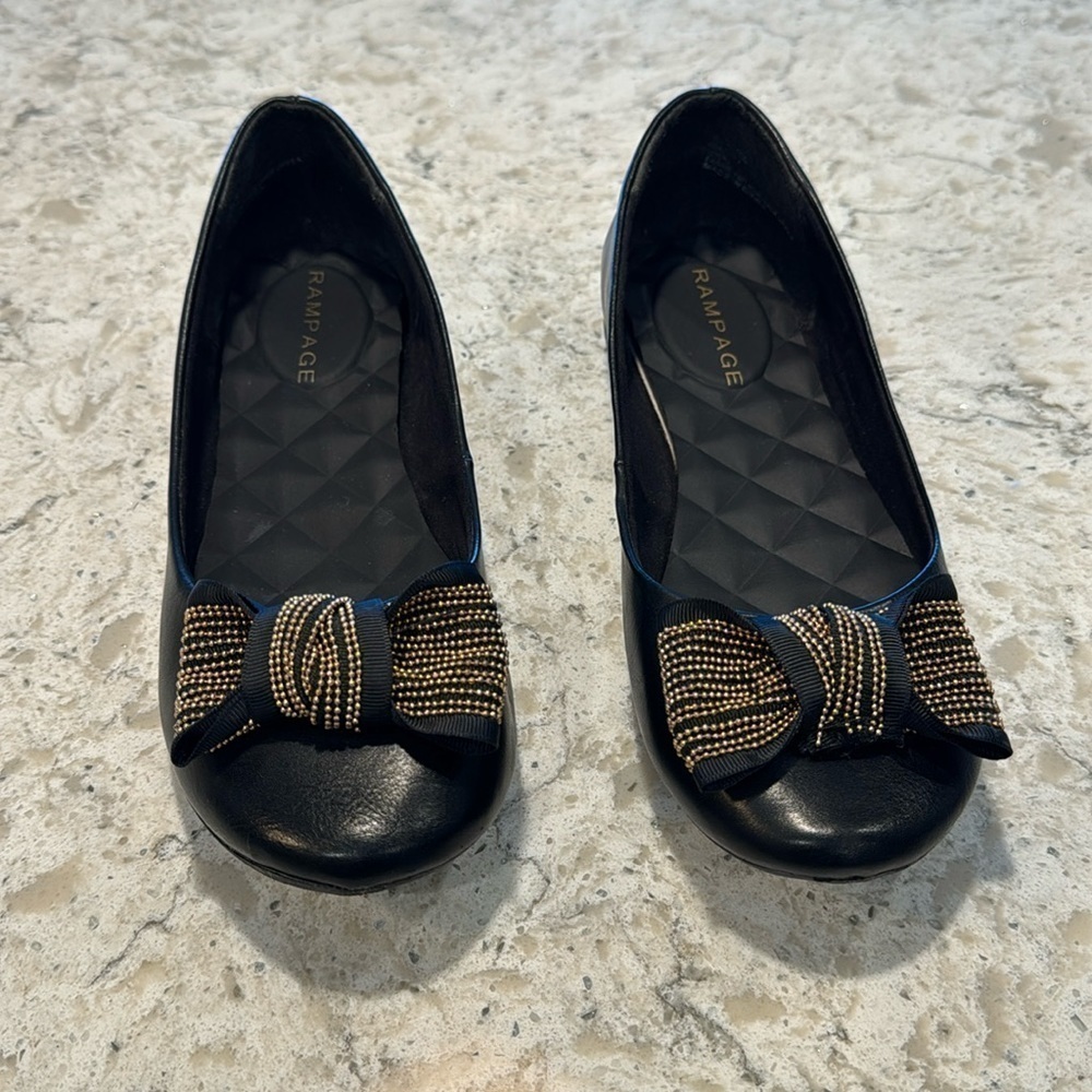 BLACK RAMPAGE~FLATS WITH BLACK~GOLD BEADED BOW~ON TOES~GOOD CONDITION~BR